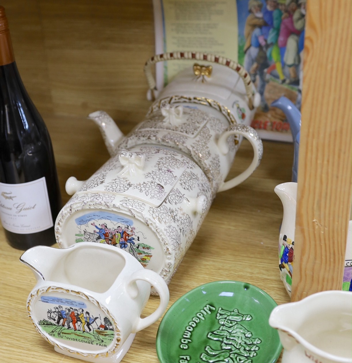 A quantity of novelty items relating to Widecombe Fair, to include jugs, teapots etc.